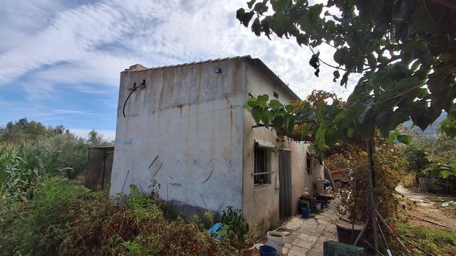 Rustic house in Seron, Almeria with surrounding garden and natural landscape.