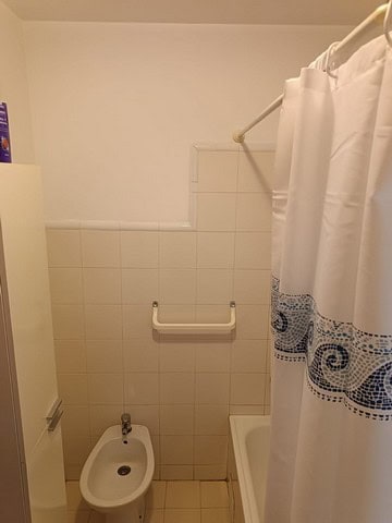 Cozy apartment bathroom in Seron, Almeria with shower and essential fixtures.