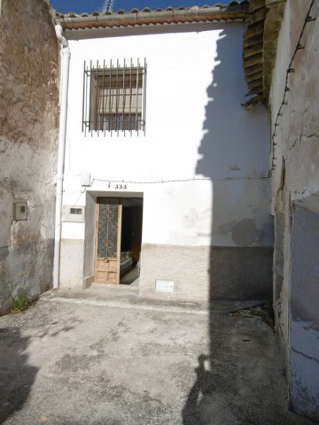 Rural property in Don Pedro, Jaen, featuring traditional architecture and rustic charm. Perfect for.