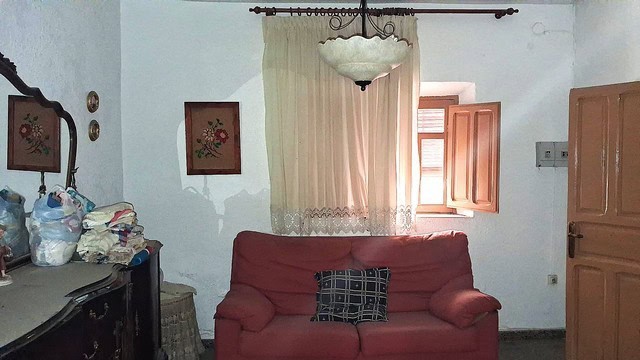 Charming town house interior in Purchena, Almeria, featuring traditional decor and cozy living space.