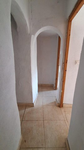 Interior view of a rustic rural property in Albox, Almeria, showcasing traditional architecture and.