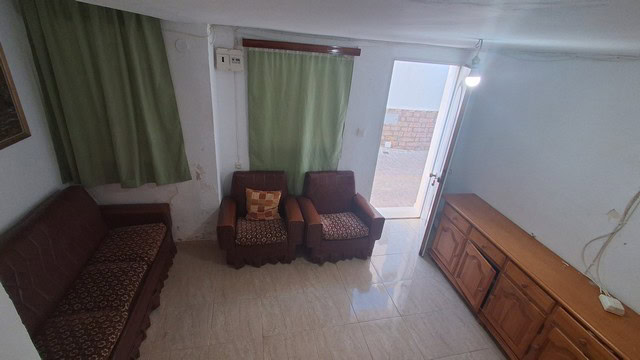 Bright living room with traditional furniture in Seron village, Almeria.