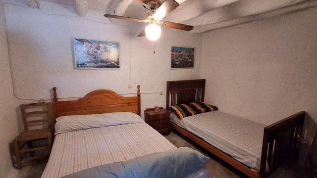 Charming village home with two bedrooms in Seron, Almeria, featuring rustic interiors and cozy ambia.