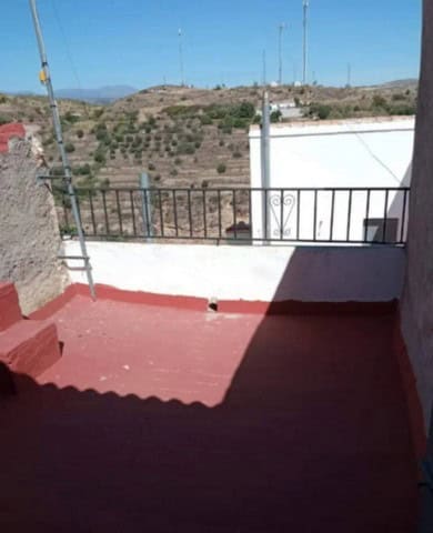 Charming terrace of a village property in Seron, Almeria with scenic mountain views and outdoor spac.