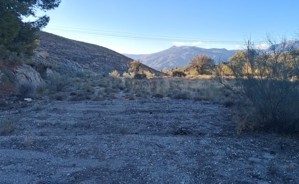 Land plot in Somontin, Almeria, ideal for building or farming. Scenic mountain views and natural sur.