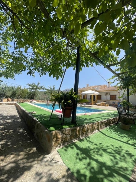 Pool and garden at rural property in Quesada, Jaen, Spain.