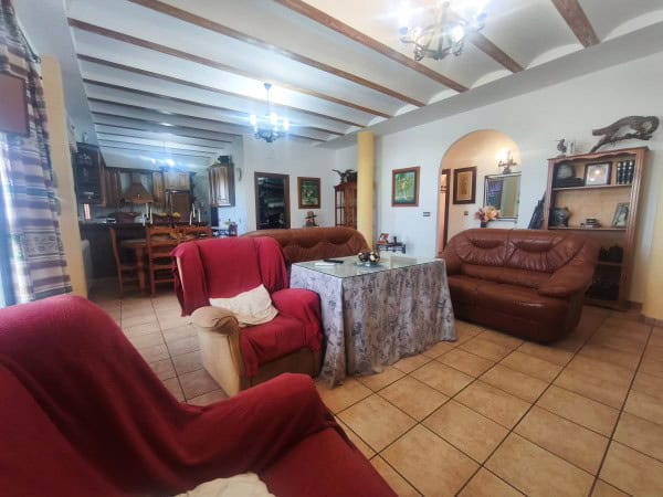 Cozy living room with traditional decor in a rural property in Quesada, Jaen, featuring comfortable.