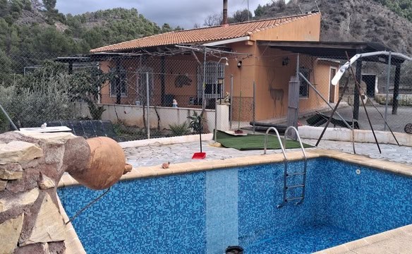 Charming rural property in Purchena, Almeria, featuring a private pool and scenic mountain views.