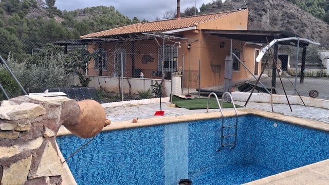 Charming rural property in Purchena, Almeria, featuring a private pool and scenic mountain views.