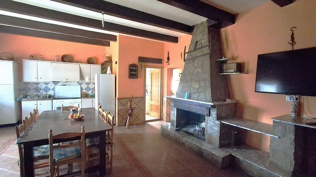 Charming rural home with spacious living area and traditional fireplace in Purchena, Almeria.