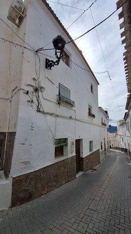 Village property in Urracal, Almeria with traditional whitewashed walls and narrow street views.