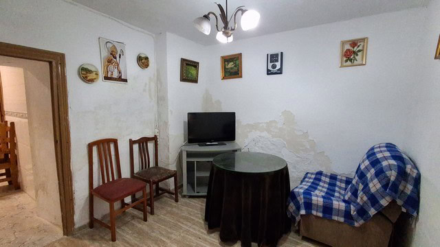 Charming village home in Urracal, Almeria with simple living space and traditional decor.