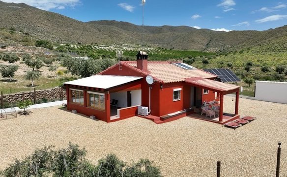 Villa in Uleila del Campo, Almeria with solar panels and spacious outdoor area.