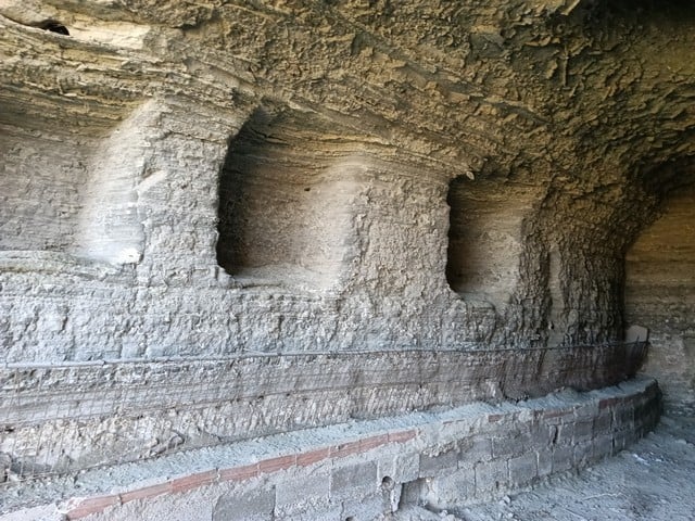 Cave house carved into the rock in Benamaurel, Granada, showcasing unique underground living archite.