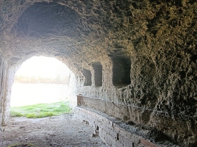 Cave house in Benamaurel, Granada, built into a natural cave with a scenic view and rustic charm.