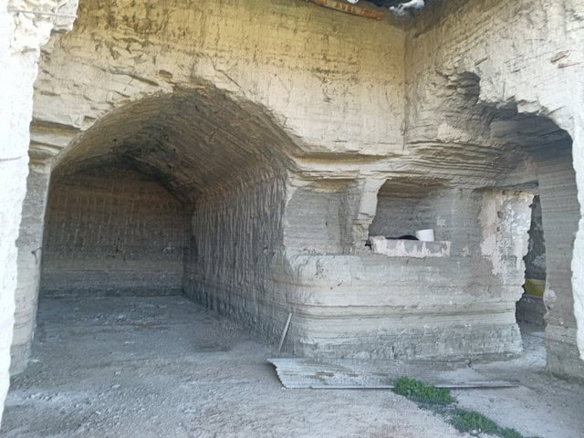 Cave house carved into the rock in Benamaurel, Granada, showcasing unique underground living spaces.
