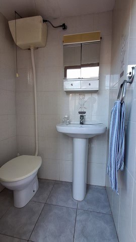 Compact bathroom with toilet and sink in Seron, Almeria.