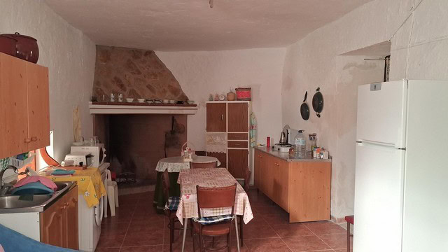 Charming town house interior in Seron, Almeria, featuring a cozy kitchen and dining area.