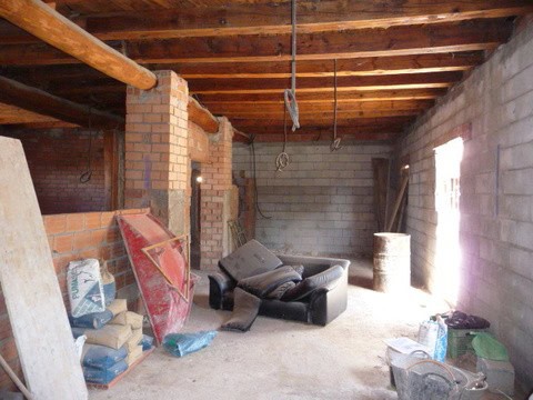 Interior view of a rustic village property in Pozo Alcon, Jaen, showing unfinished walls and constru.
