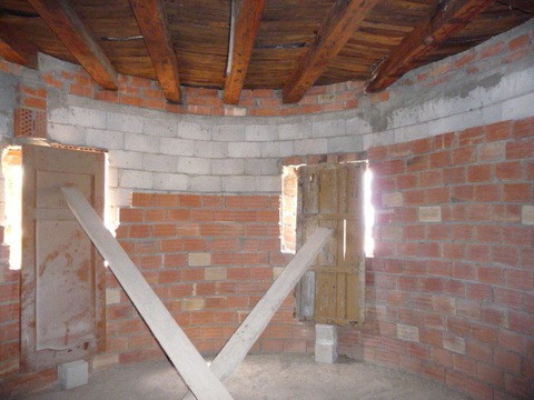 Village property interior with brick walls and wooden ceiling in Pozo Alcon, Jaen.