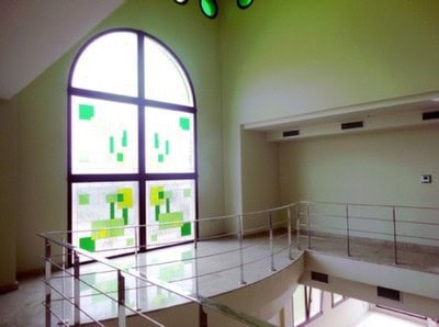 Elegant interior of a country estate in Pozo Alcon, Jaen with modern stained glass windows.
