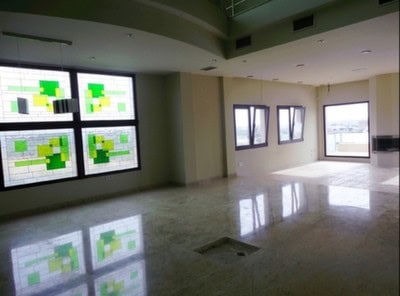 Elegant interior with large windows and modern design in Pozo Alcon estate.