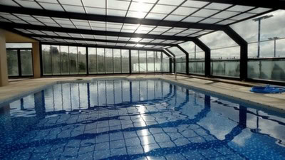 Indoor swimming pool with glass walls in a country estate in Pozo Alcon, Jaen. Perfect for relaxatio.