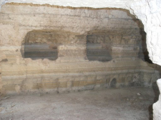 Ruin in Benamaurel, Granada with ancient stone walls and openings.