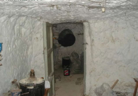 Cave house interior in Orce, Granada, showcasing traditional underground living space.