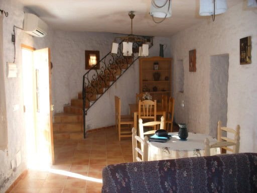 Charming interior of a village property in Gorafe, Granada, featuring rustic decor and traditional a.