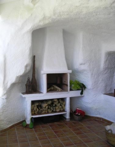 Traditional cave house fireplace in Granada.