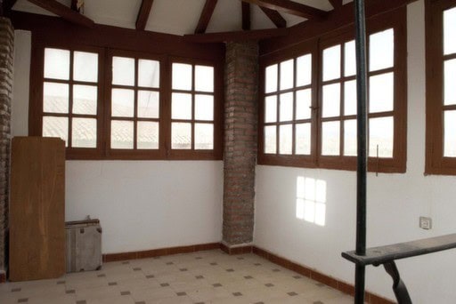Charming village property in Guadix, Granada with spacious interior and large windows offering natur.