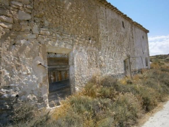 Old stone rural property in Venta del Peral, Granada, ideal for renovation or development.
