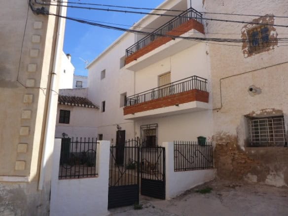 Charming village house with balconies in Freila, Granada, ideal for rural living.