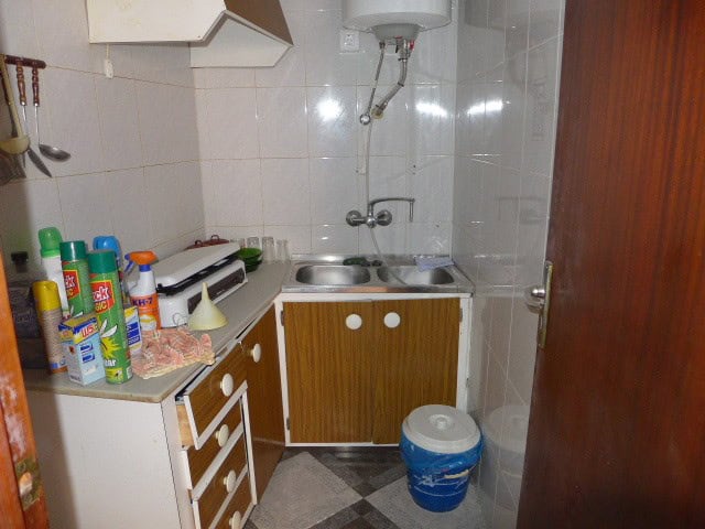 Charming kitchen in a village property located in Freila, Granada, featuring basic amenities and a c.