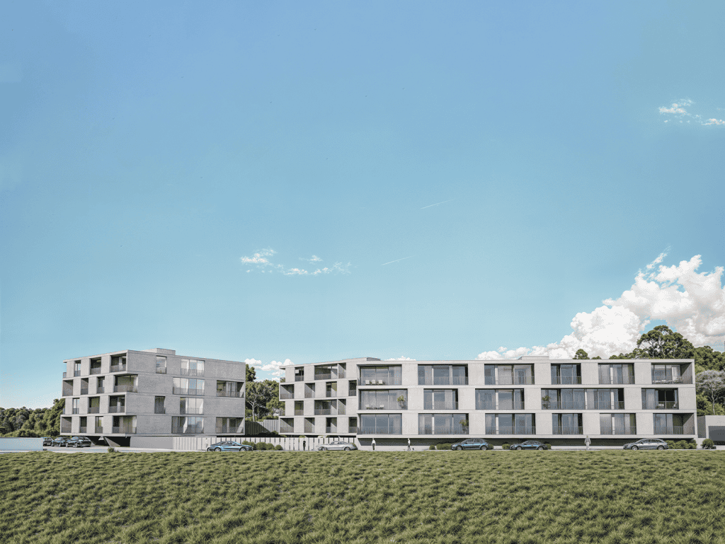 Contemporary apartment complex in Viana do Castelo, Portugal, with spacious balconies and lush surro.