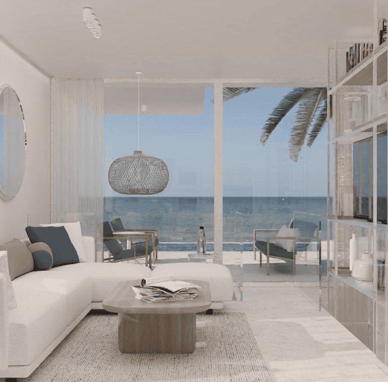 Sea view living room with modern decor and large windows overlooking Chamolia Beach, Athens, Greece.