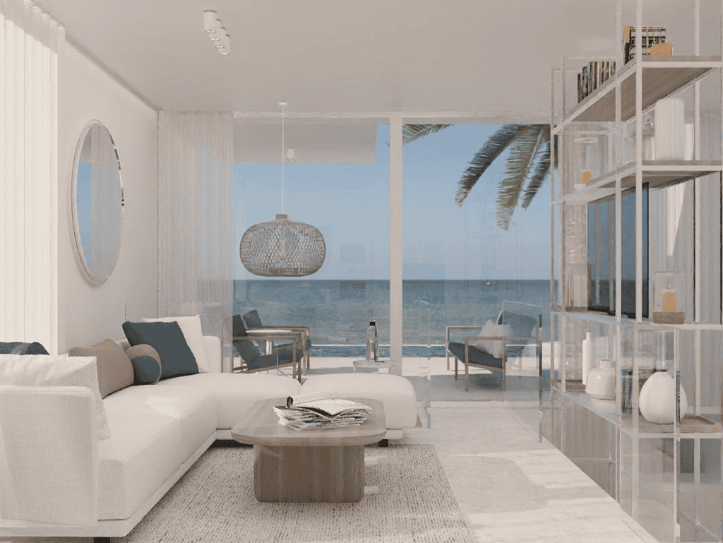 Sea view living room with modern decor and large windows overlooking Chamolia Beach, Athens, Greece.