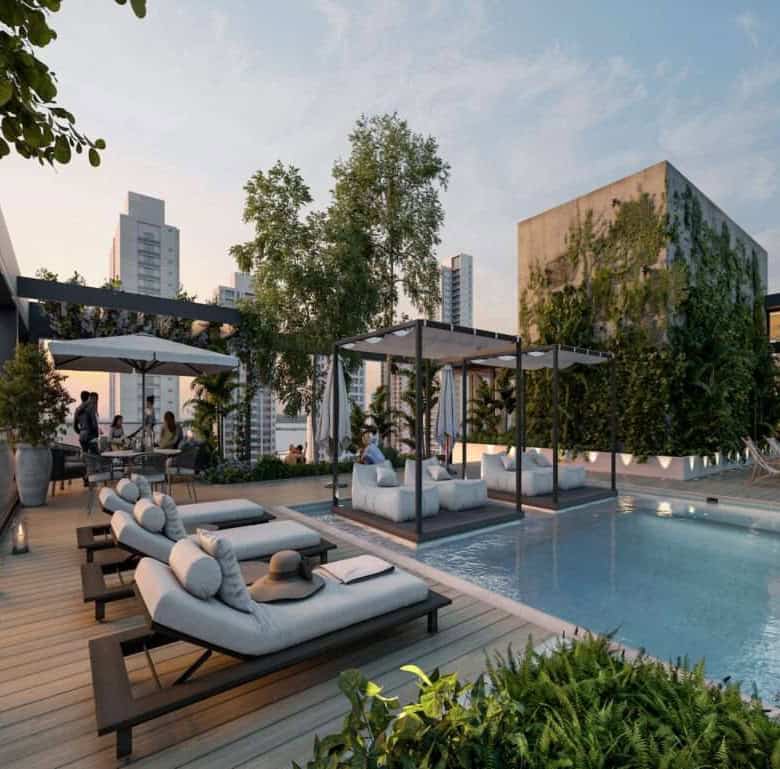 Panama City rooftop pool with sunbeds, shaded cabanas, and city skyline views. Perfect for relaxatio.