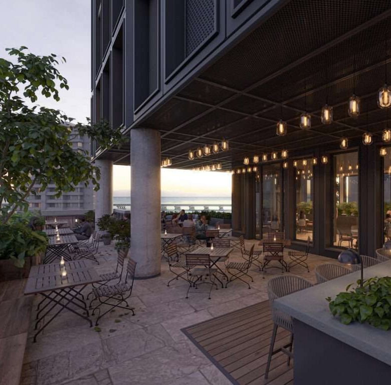 Panama City rooftop terrace featuring outdoor seating, modern design, and warm ambient lighting.