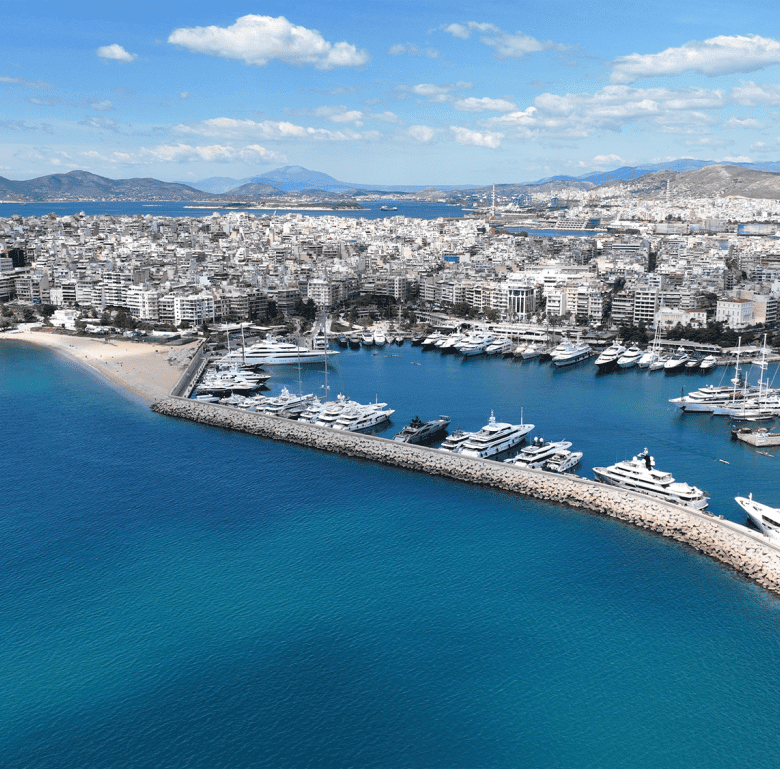 Aerial view of Skyway in Athens, Greece, showcasing the marina and city skyline.
