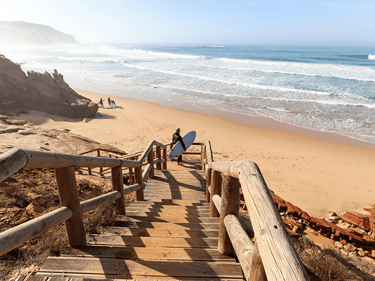 Beach stairs leading to the Atlantic Ocean in Peniche, Portugal.