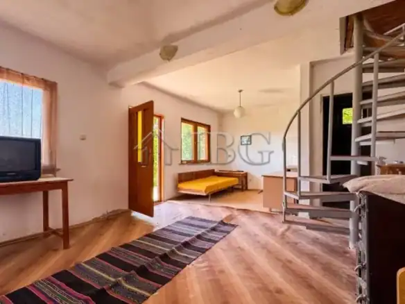 Spacious interior of a three-story house with land in the village of Kitka, Burgas region, ideal for.