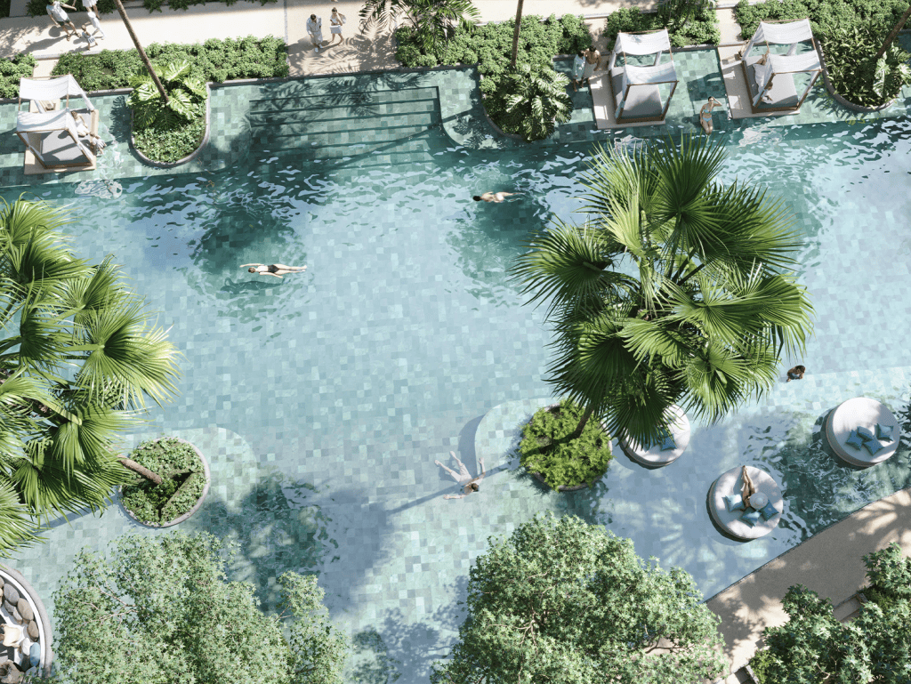 Luxury pool with lush greenery at Sudara Phuket, Thailand. Perfect for relaxation and enjoying tropi.