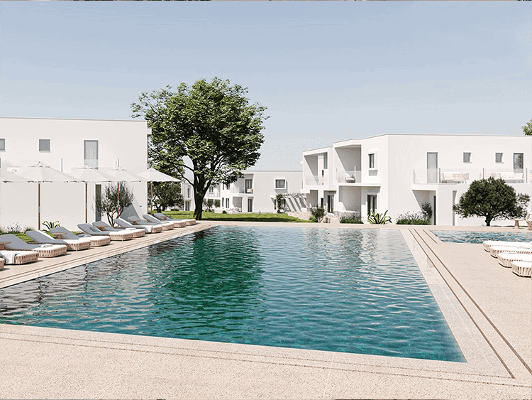 Algarve, Portugal luxury resort with swimming pool and sun loungers.