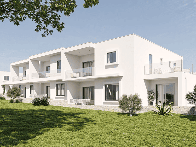 Contemporary white apartments with balconies in Carvoeiro, Algarve, Portugal.