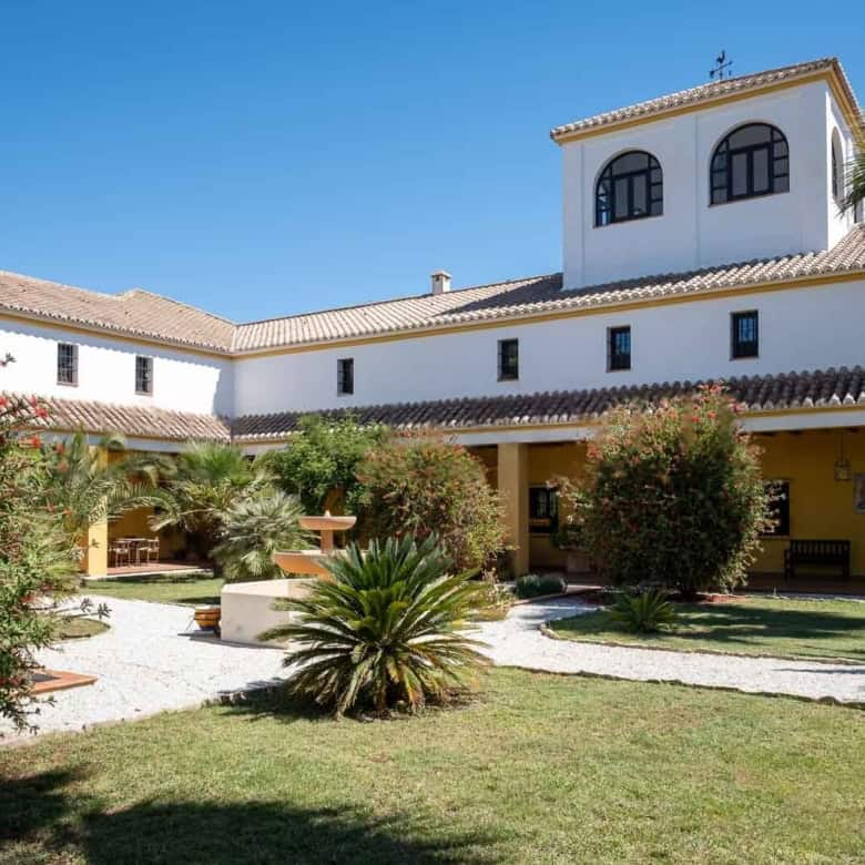 Elegant Spanish villa featuring lush gardens and a private pool. Perfect for luxurious living and in.