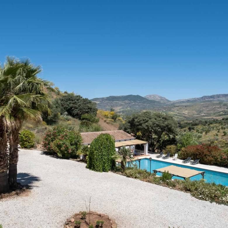 Luxury villa with private pool and lush surroundings in a tranquil setting. Perfect for relaxing hol.