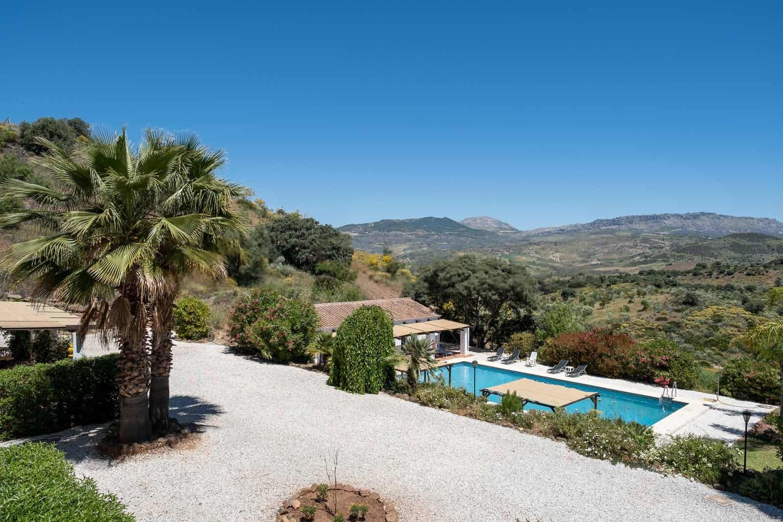 Luxury villa with private pool and lush surroundings in a tranquil setting. Perfect for relaxing hol.