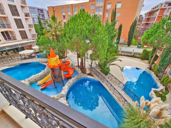 Stylish 2-bedroom apartment featuring a pool view and lush garden surroundings in Sunny Beach. Perfe.